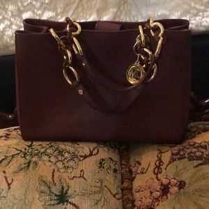 Gorgeous burgundy Michael Kors burgundy handbag!